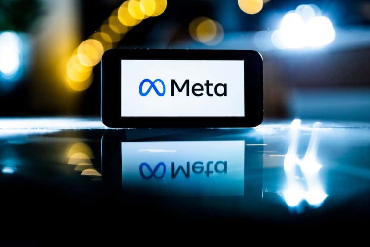 BERLIN, GERMANY - FEBRUARY 07: In this photo illustration the logo of Meta is pictured on a smartphone display on February 07, 2022 in Berlin, Germany. (Photo Illustration by Florian Gaertner/Getty Images)