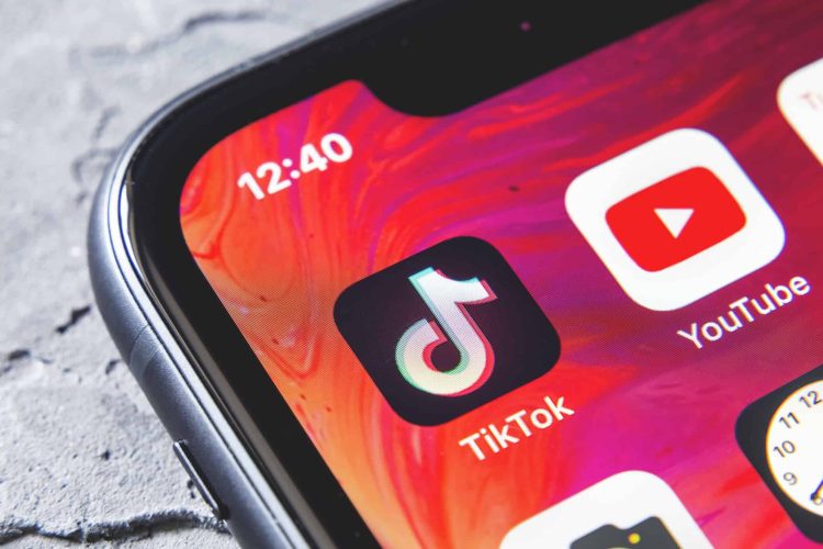 Tyumen, Russia - April 30,2019: TikTok and YouTube apps on screen iphone xr, close up